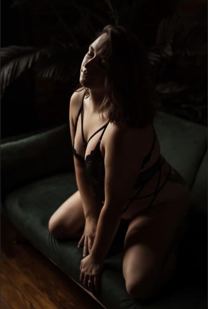 client posing for a boudoir photoshoot